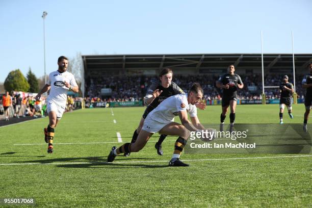 Josh Bassett of Wasps scores his team's fourth try during the Aviva Premiership match between Newcastle Falcons and Wasps at Kingston Park on May 5,...