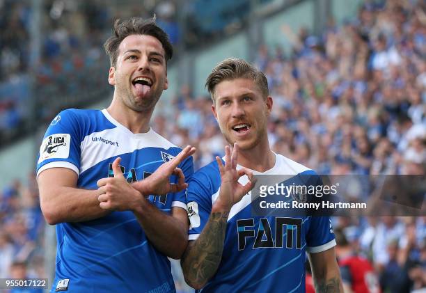 Christian Beck of 1. FC Magdeburg celebrates after scoring his team's opening goal with Philip Tuerpitz of 1. FC Magdeburg during the 3. Liga match...