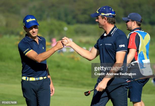 Joakim Lagergren of Sweden and Alexander Bjork of Sweden celebrate on the 3rd hole during Day One of the GolfSixes at The Centurion Club on May 5,...