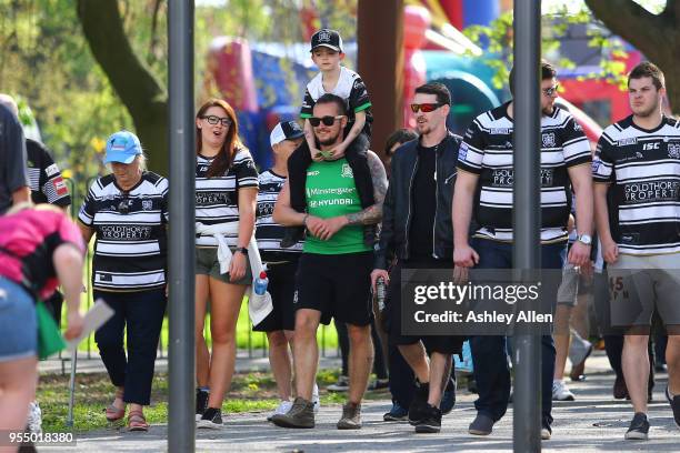 Fans of Hull FC make their way to the ticket office during the Betfred Super League match between Hull FC and Castleford Tigers at KCOM Stadium on...