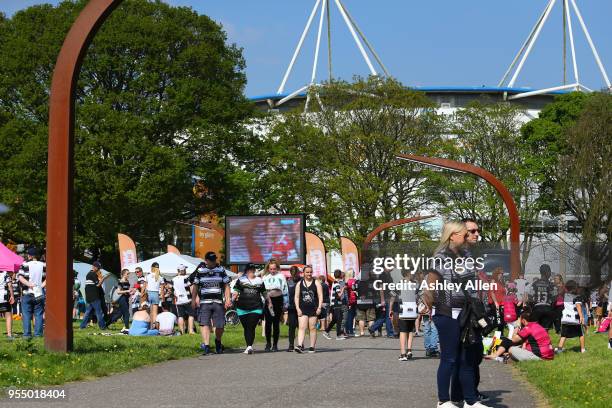 Crowds stream into the KCOM Stadium ahead of the Betfred Super League match between Hull FC and Castleford Tigers at KCOM Stadium on May 5, 2018 in...