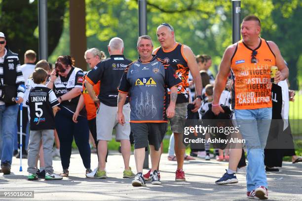 Fans of Castleford Tigers make their way into the KCOM Stadium ahead of the Betfred Super League match between Hull FC and Castleford Tigers at KCOM...