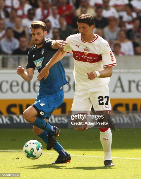Mario Gomez of VfB Stuttgart is challenged by Havard Nordtveit of 1899 Hoffenheim during the Bundesliga match between VfB Stuttgart and TSG 1899...