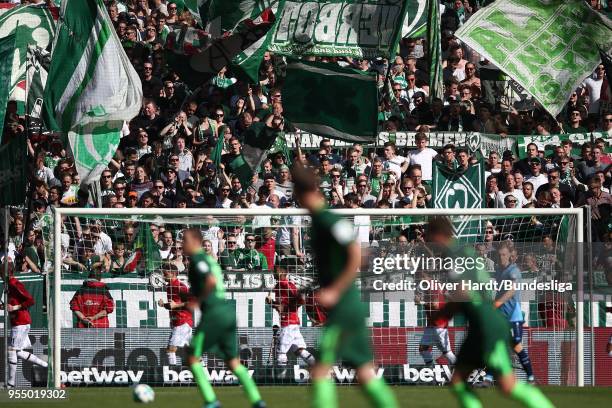 Supporters of Bremen during the Bundesliga match between SV Werder Bremen and Bayer 04 Leverkusen at Weserstadion on May 5, 2018 in Bremen, Germany.