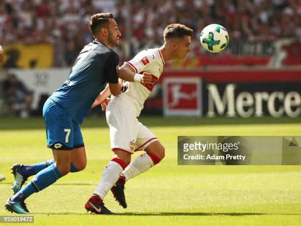 Erik Thommy of VfB Stuttgart is challenged by Lukas Rupp of 1899 Hoffenheim during the Bundesliga match between VfB Stuttgart and TSG 1899 Hoffenheim...