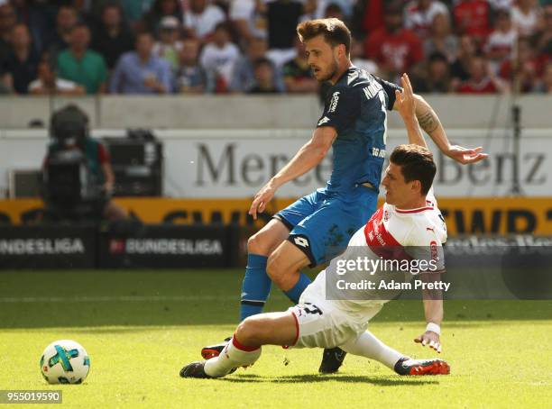 Mario Gomez of VfB Stuttgart is challenged by Havard Nordtveit of 1899 Hoffenheim during the Bundesliga match between VfB Stuttgart and TSG 1899...