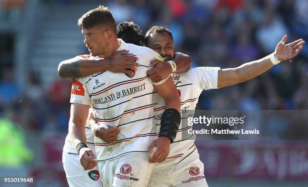 Mike Williams of Leicester Tigers is congratulated on his try during the Aviva Premiership match between Sale Sharks and Leicester Tigers at AJ Bell...