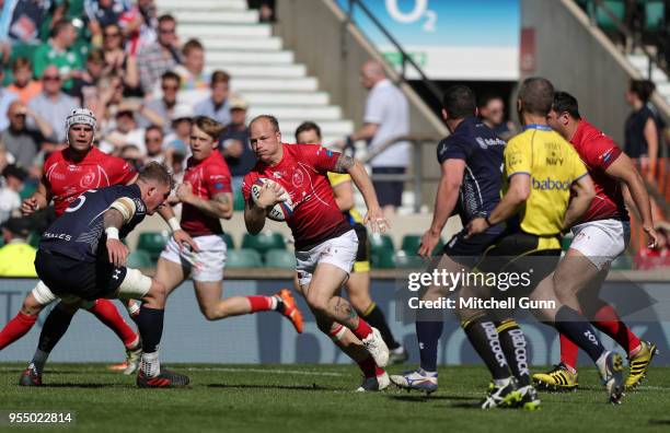 Owain Davies of The British Army runs with the ball during the Babcock Trophy rugby union match between The British Army and the Royal Navy played in...