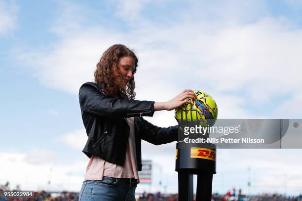 Olympic biathlon gold medalist Hanna Oeberg delivers the match ball ahead of the Allsvenskan match between Ostersunds FK and IFK Norrkoping at...