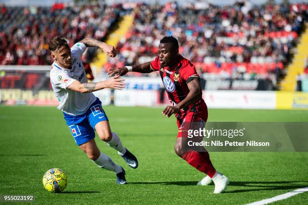 Linus Wahlqvist of IFK Norrkoping and Patrick Kpozo of Ostersunds FK competes for the ball during the Allsvenskan match between Ostersunds FK and IFK...