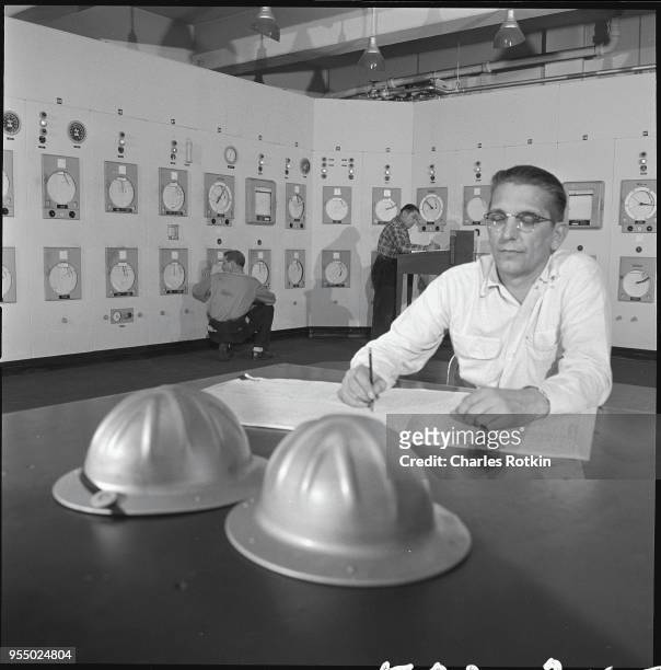 Employee at a texaco refinery, circa 1957, Illinois, USA.