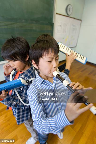 Melodica Instrument Photos and Premium High Res Pictures - Getty Images