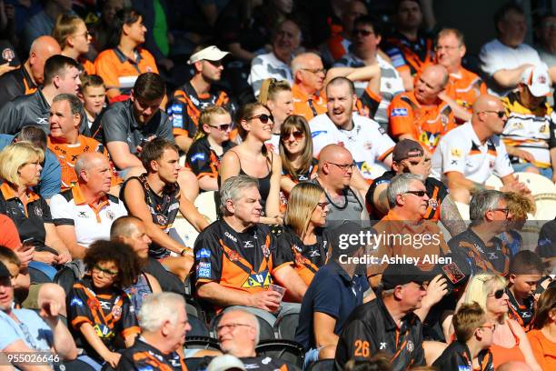 Fans of the Castleford Tigers look on during the Betfred Super League match between Hull FC and Castleford Tigers at KCOM Stadium on May 5, 2018 in...