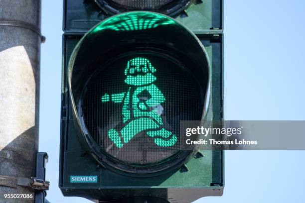 Pedestrian traffic light with the German philosopher and revolutionary Karl Marx pictured on the 200th anniversary of the birth of Karl Marx on May...