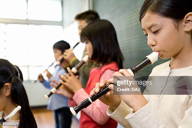 Students Using Instruments 511 Practicing Recorder Stock Photos, High-Res Pictures, and Images ...