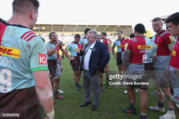 The Harlequins Director of Rugby, John Kingston talks to his players after his final game in charge after the Aviva Premiership match between...