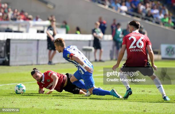 Martin Harnik of Hannover 96, Peter Pekarik of Hertha BSC and Kenan Karaman of Hannover 96 during the Bundesliga game between Hannover 96 and Hertha...