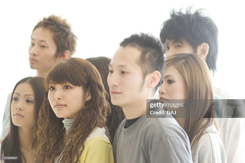 Medium group of young university students, white background