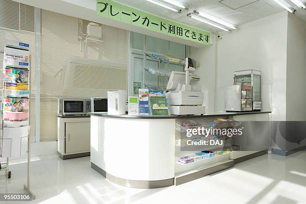 cash register at a convenience store - checkout register stock pictures, royalty-free photos & images