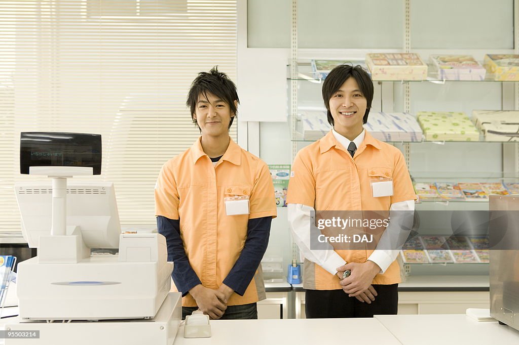 Portrait of two cashiers