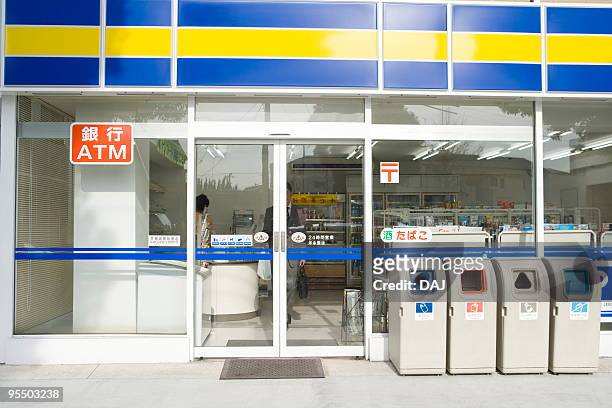 front view of convenience store - tante emma laden stock-fotos und bilder