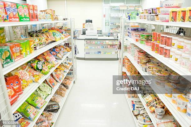 interior of convenience store - convenience store counter stock-fotos und bilder