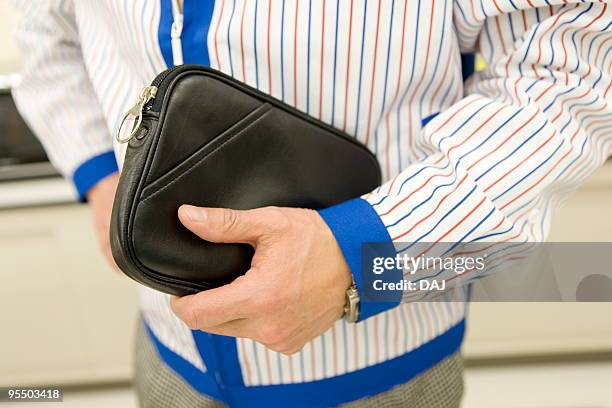 store manager holding a bag - itabashi ward stock pictures, royalty-free photos & images