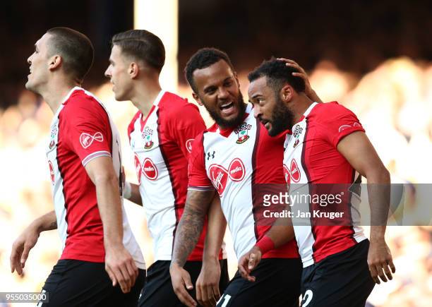 Nathan Redmond of Southampton celebrates with Ryan Bertrand of Southampton after scoring his sides first goal during the Premier League match between...