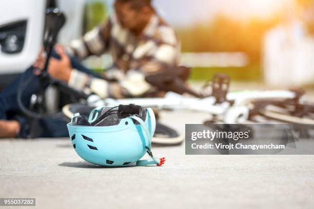 bike accident - injured street stockfoto's en -beelden