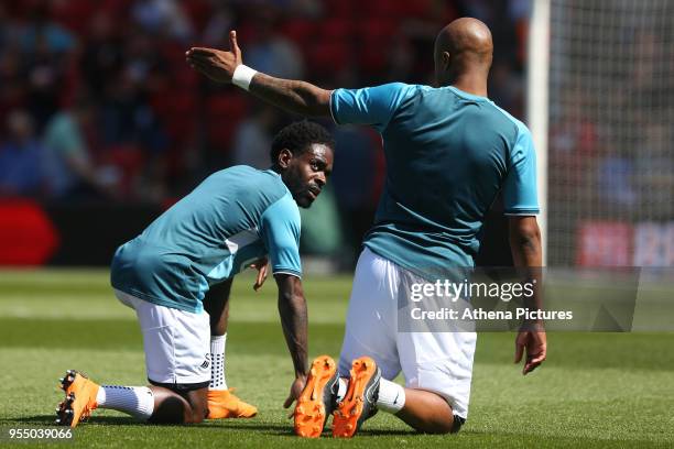 Nathan Dyer talks with Andre Ayew of Swansea City prior to kick off of the Premier League match between AFC Bournemouth and Swansea City at Vitality...