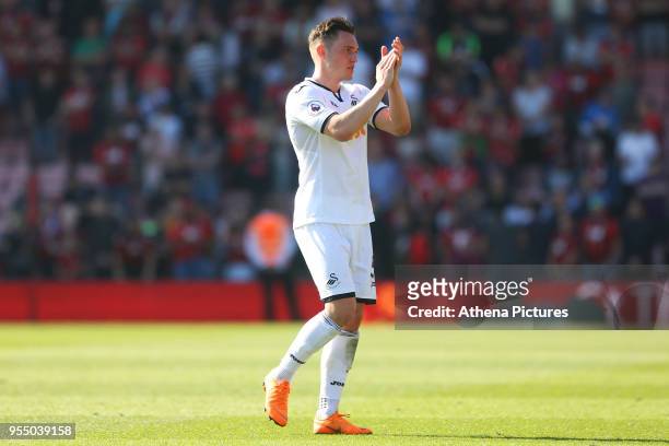 Connor Roberts of Swansea City applauds the fan after the final whistle of the Premier League match between AFC Bournemouth and Swansea City at...