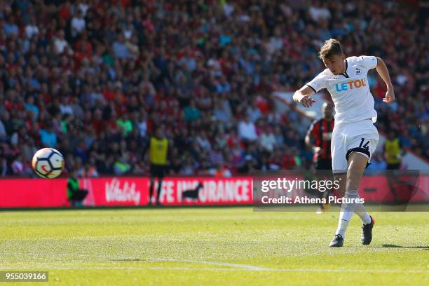 Tom Carroll of Swansea City fires a shot on goal during the Premier League match between AFC Bournemouth and Swansea City at Vitality Stadium on May...