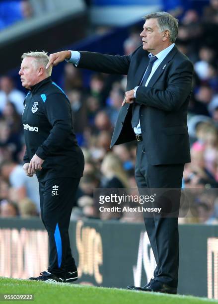 Sam Allardyce, Manager of Everton and Sammy Lee, Assistant manager give instruction to their team during the Premier League match between Everton and...