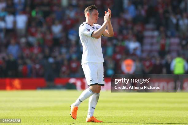 Connor Roberts of Swansea City applauds the fan after the final whistle of the Premier League match between AFC Bournemouth and Swansea City at...