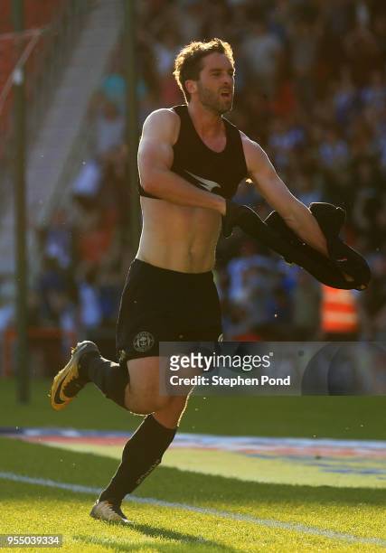 Will Grigg of Wigan Athletic celebrates after scoring his sides first goal during the Sky Bet League One match between Doncaster Rovers and Wigan...