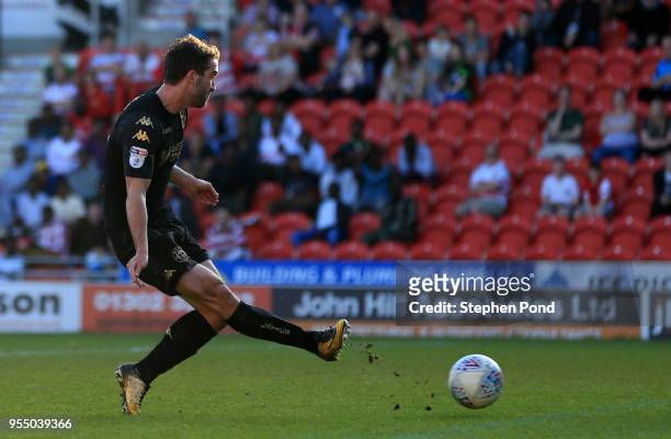 Will Grigg of Wigan Athletic scores his sides first goal during the Sky Bet League One match between Doncaster Rovers and Wigan Athletic at Keepmoat...