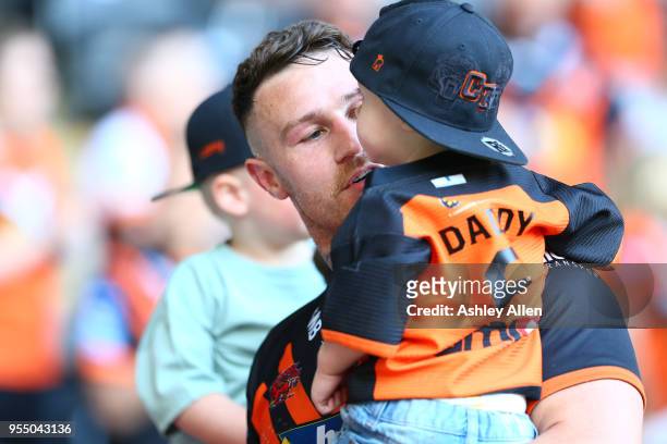 Jamie Ellis of Castleford Tigers and his son during the Betfred Super League match between Hull FC and Castleford Tigers at KCOM Stadium on May 5,...