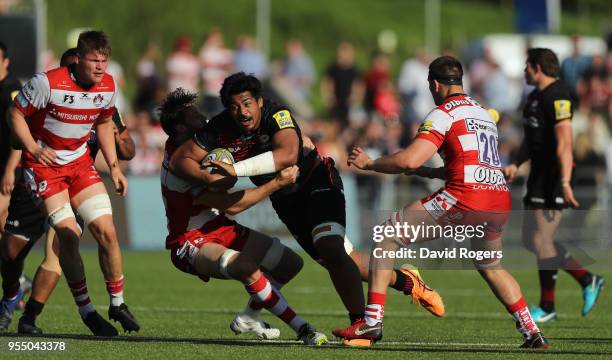 Will Skelton of Saracens is held by Jeremy Thrush during the Aviva Premiership match between Saracens and Gloucester Rugby at Allianz Park on May 5,...