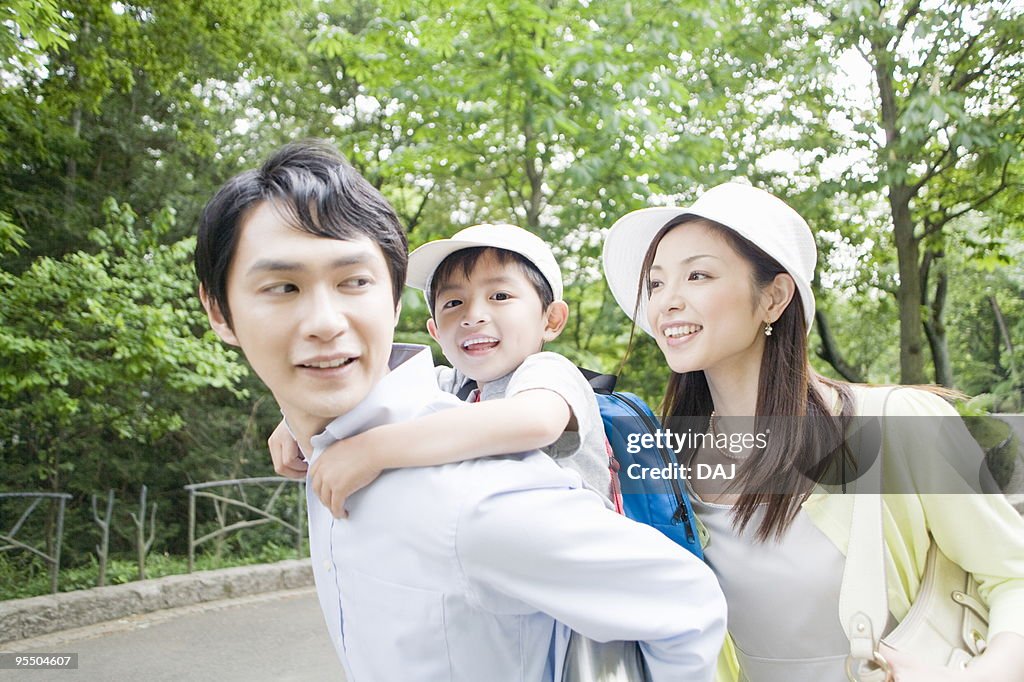 Son Piggybacks on Father