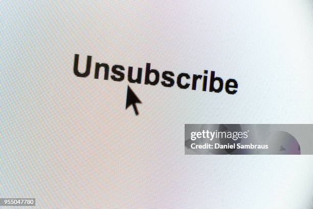 "unsubscribe" web button and mouse arrow on computer screen - unsubscribe stock pictures, royalty-free photos & images