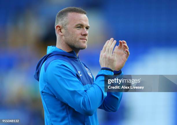 Wayne Rooney of Everton shows appreciation to the fans during the lap of honour after the Premier League match between Everton and Southampton at...