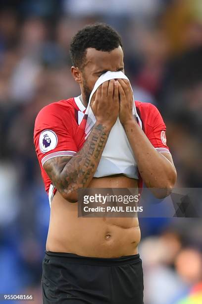Southampton's English defender Ryan Bertrand reacts at the final whistle during the English Premier League football match between Everton and...