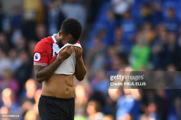 Southampton's English defender Ryan Bertrand reacts at the final whistle during the English Premier League football match between Everton and...