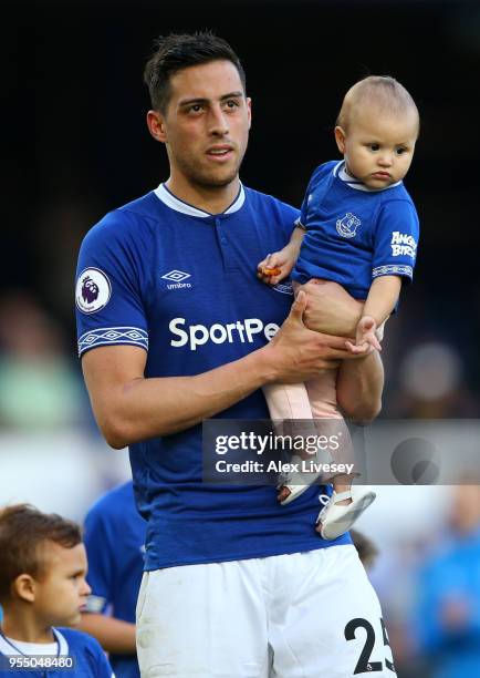 Ramiro Funes Mori of Everton takes part in the lap of honour with his children after the Premier League match between Everton and Southampton at...