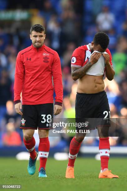 Southampton's English midfielder Sam McQueen and Southampton's English defender Ryan Bertrand react at the final whistle during the English Premier...