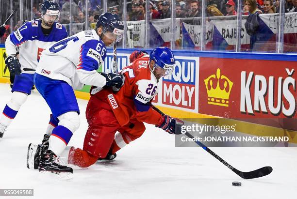 Czech Republic's Michal Repik vies with Slovakia's Martin Fehervary during the group A match Czech Republic vs Slovakia of the 2018 IIHF Ice Hockey...