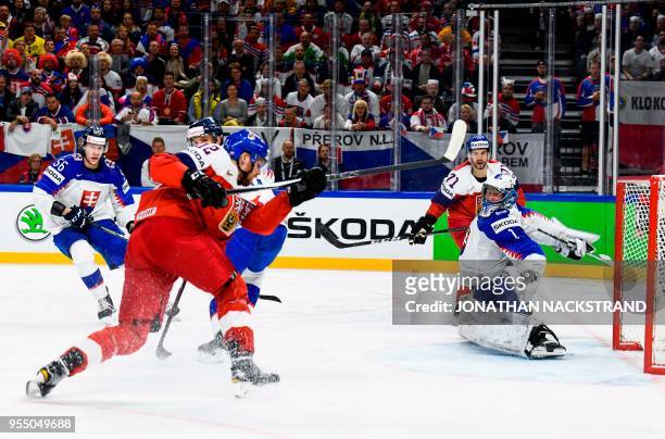 Slovakia's goalie Marek Ciliak reacts to a shot during the group A match Czech Republic vs Slovakia of the 2018 IIHF Ice Hockey World Championship at...