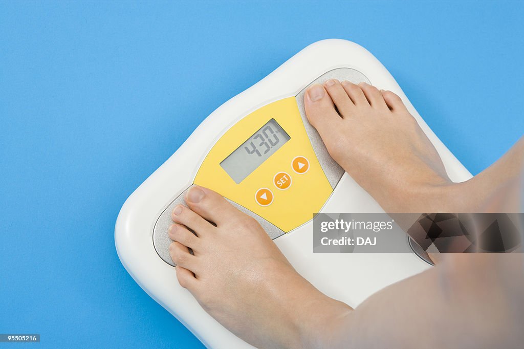 Woman on a weight scale