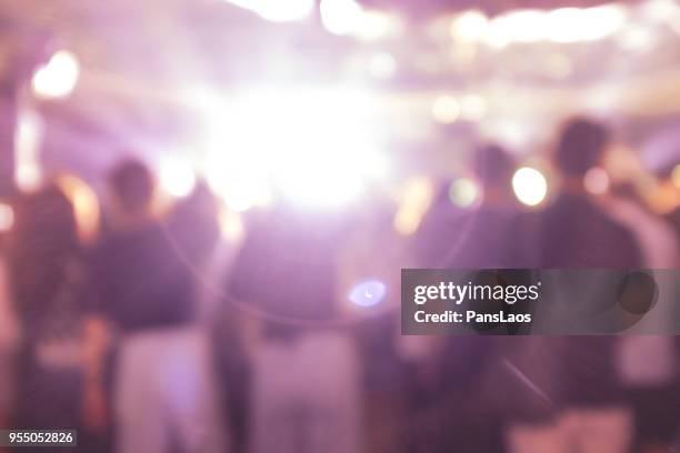 stage lights at a music concert and the crowd audience - hand back lit stock pictures, royalty-free photos & images