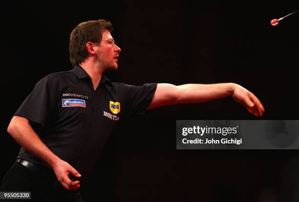 James Wade of England in action against Andy Hamilton of England during the 2010 Ladbrokes.com World Darts Championships at Alexandra Palace on...